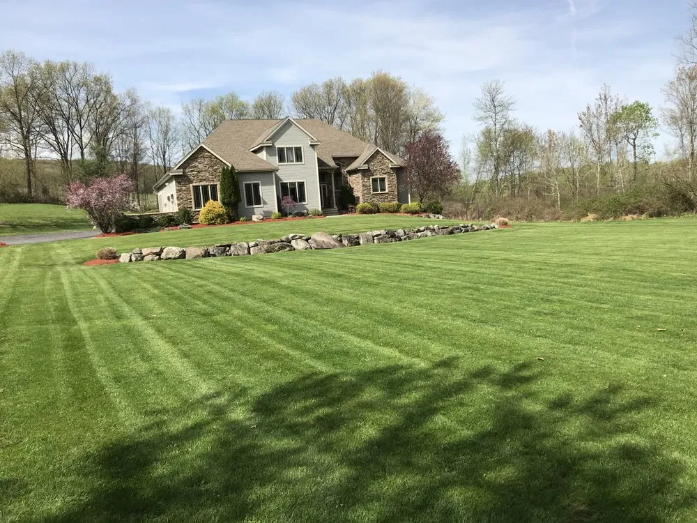 Expert lawn mowing service with custom design across Highland, NY - All American Lawn Care Services