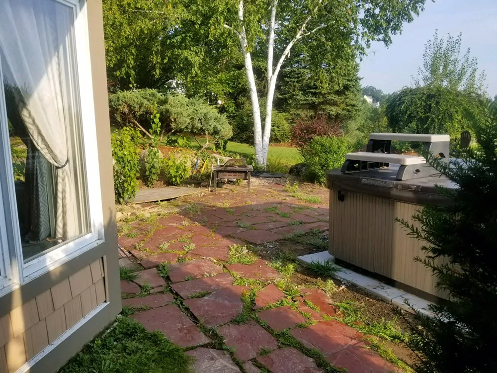 Local lawn mowing service near you across Barrington, NH - All American Stonework by Silver