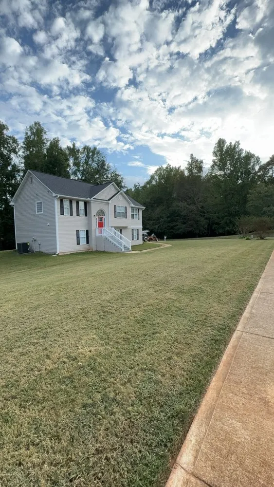 Affordable lawn mowing service near you across Locust Grove, GA - All around property improvement