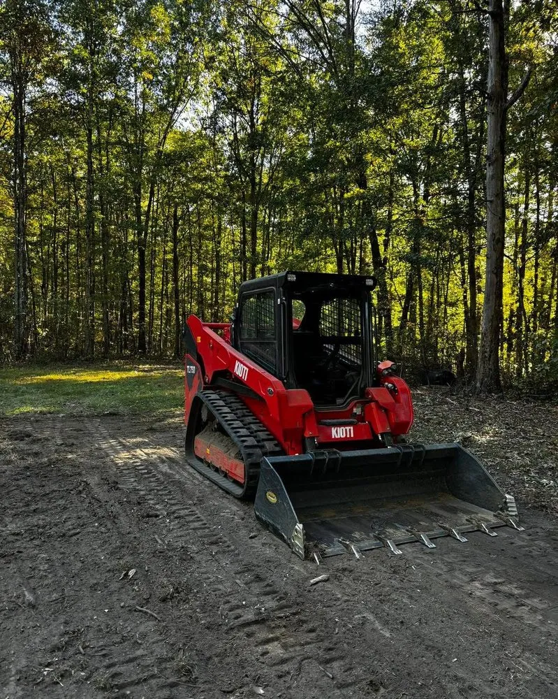 Local landscape installation with custom design in Jamestown, TN by All county Tractor and Land services