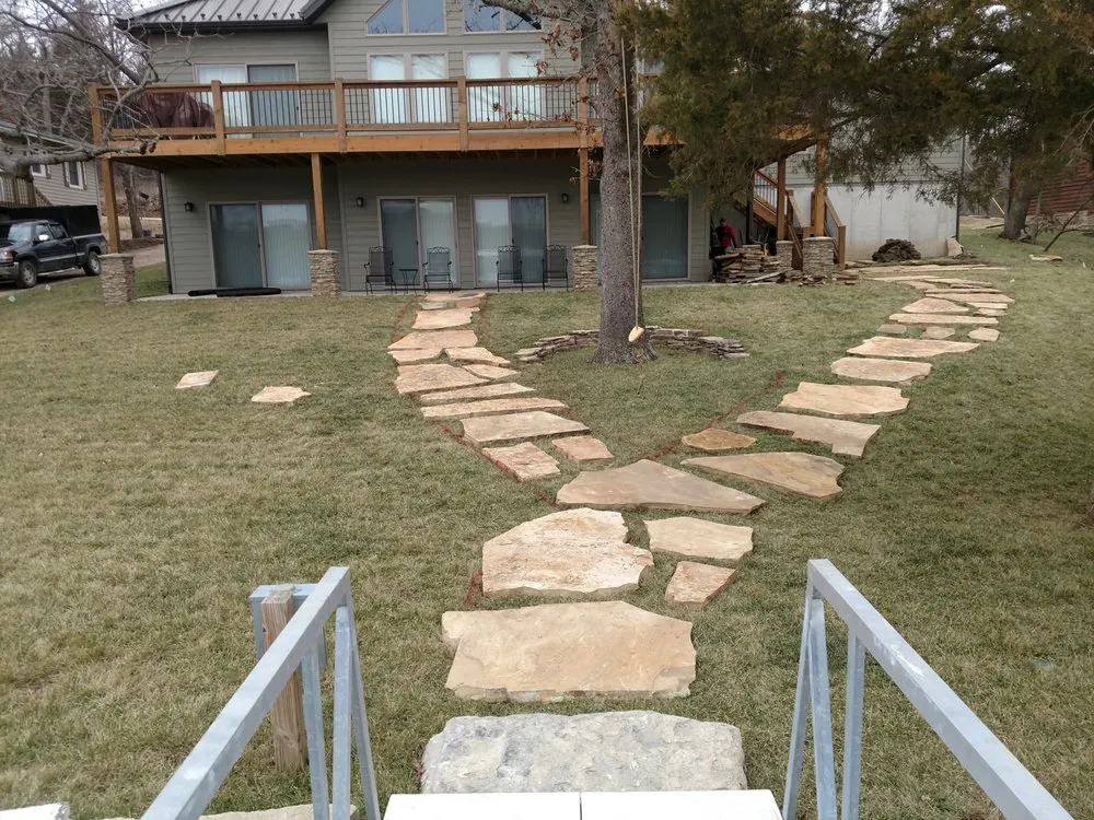 Professional outdoor landscaping for homes across Osage Beach, MO - All Green Lawn Care