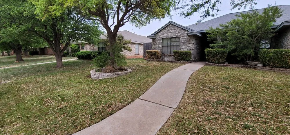 Custom residential landscaping for outdoor upgrades in San Angelo, TX by All Green Lawn Service