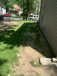 Custom outdoor landscaping for residential properties across Peoria, IL - All haul Cleaning Lawn and Hauling Services