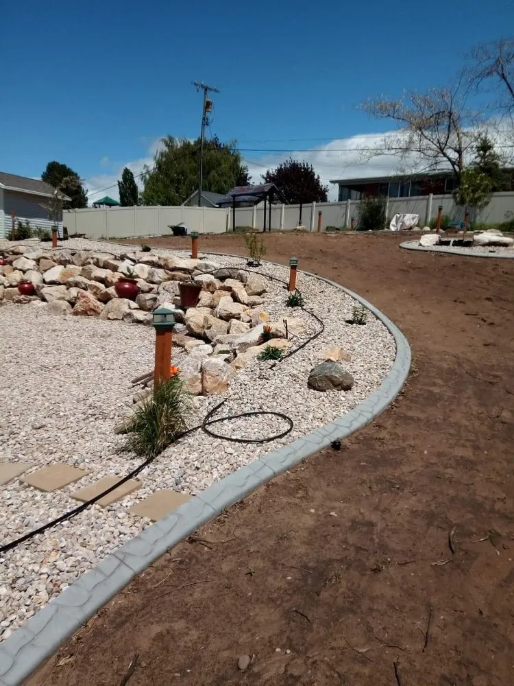 Custom garden landscaping in Clearfield, UT by All In One Concrete and Landscaping