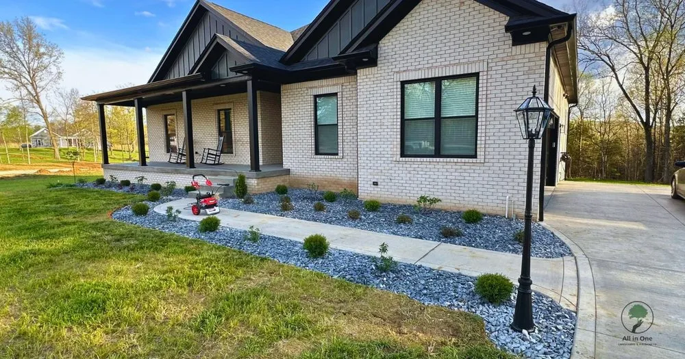 Professional landscape installation with custom design in Shepherdsville, KY by All in One Property Management