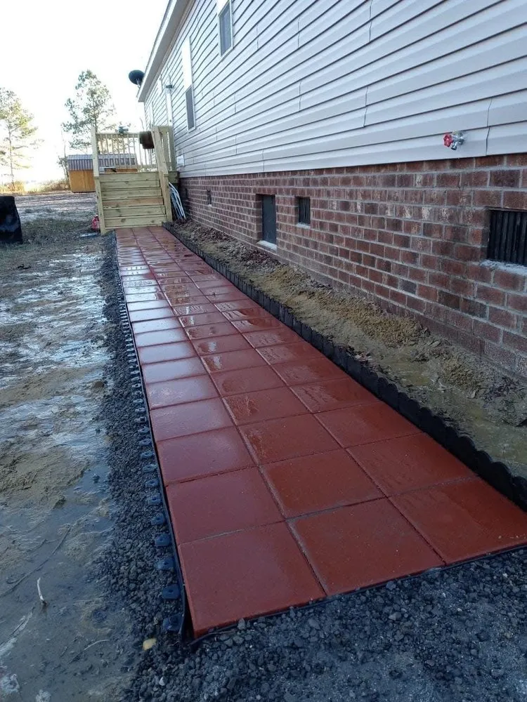 Affordable residential landscaping for year-round maintenance in Elizabeth City, NC by All In One Yard and Land Improvement