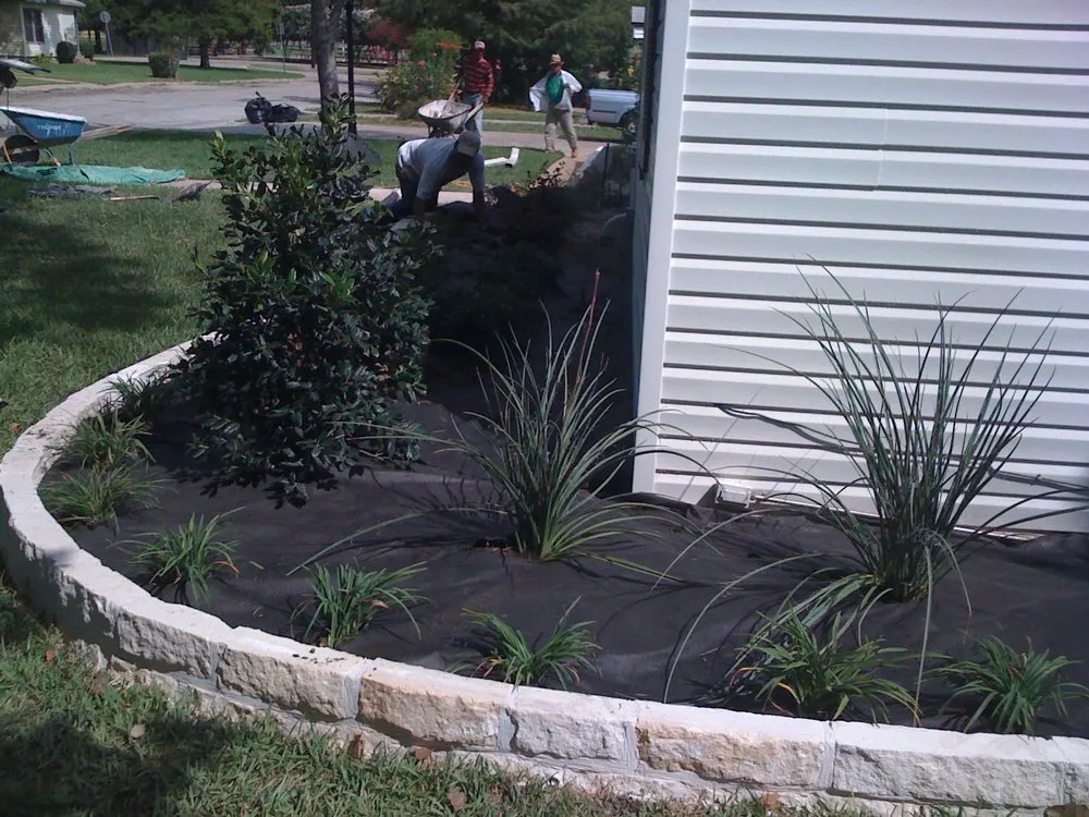 Professional garden landscaping with custom design in Royse City, TX by All N One Irrigation & Landscape