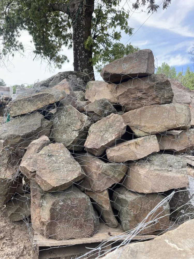 Expert yard cleanup service for residential properties across Tyler, TX - All Natural Stone & Grass