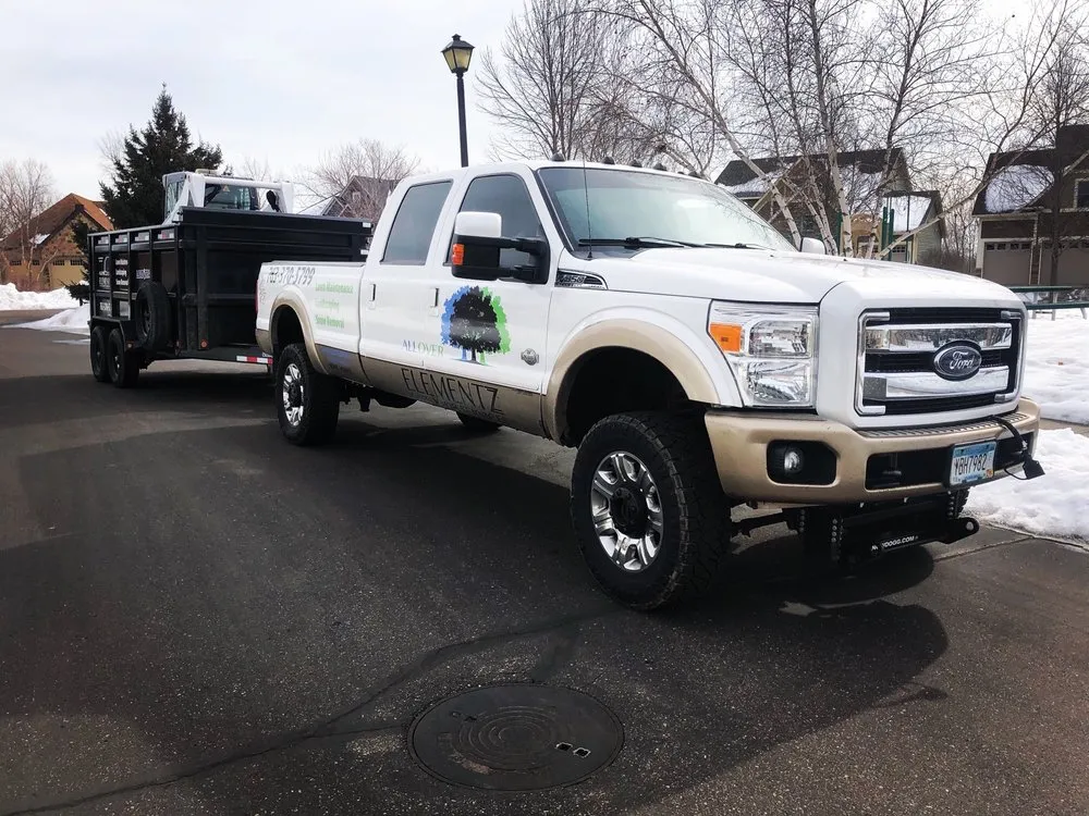 Trusted lawn mowing service for homes in Blaine, MN by All Over Elementz Outdoor Services