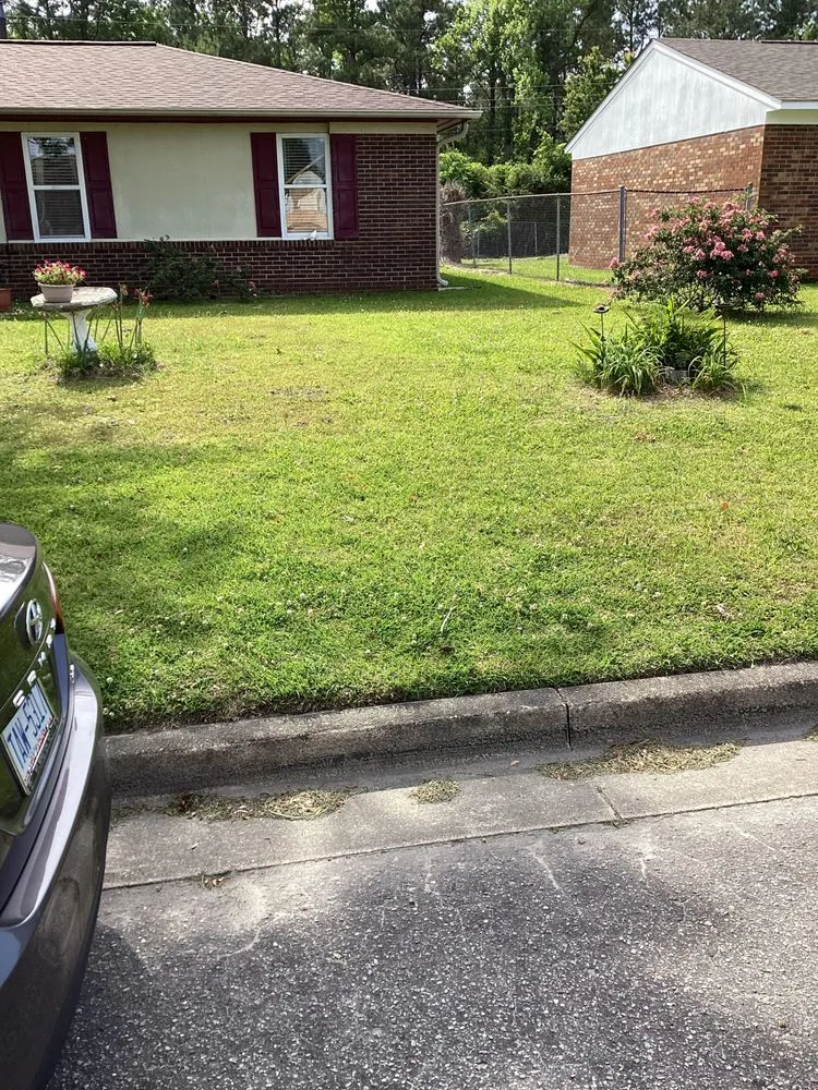 Trusted lawn mowing service with custom design in Leland, NC by All Over Pressure Washing N Landscaping