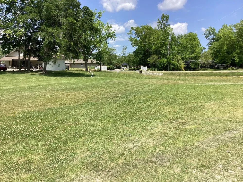 Trusted lawn mowing service for year-round maintenance in Leland, NC by All Over Pressure Washing N Landscaping