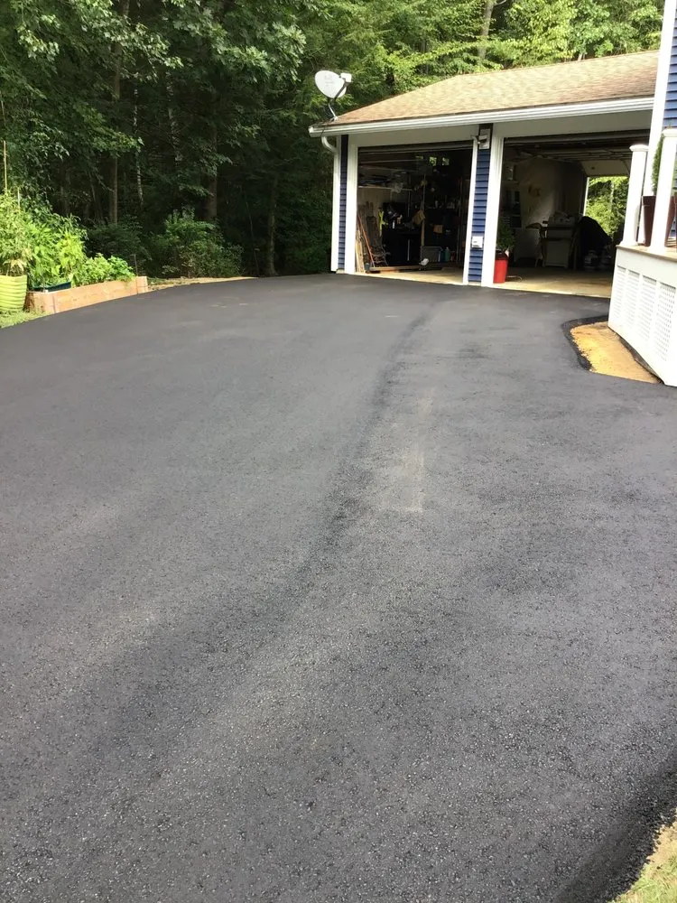 Top-rated lawn care service experts serving Raymond, NH - All Phase Paving & Excavating