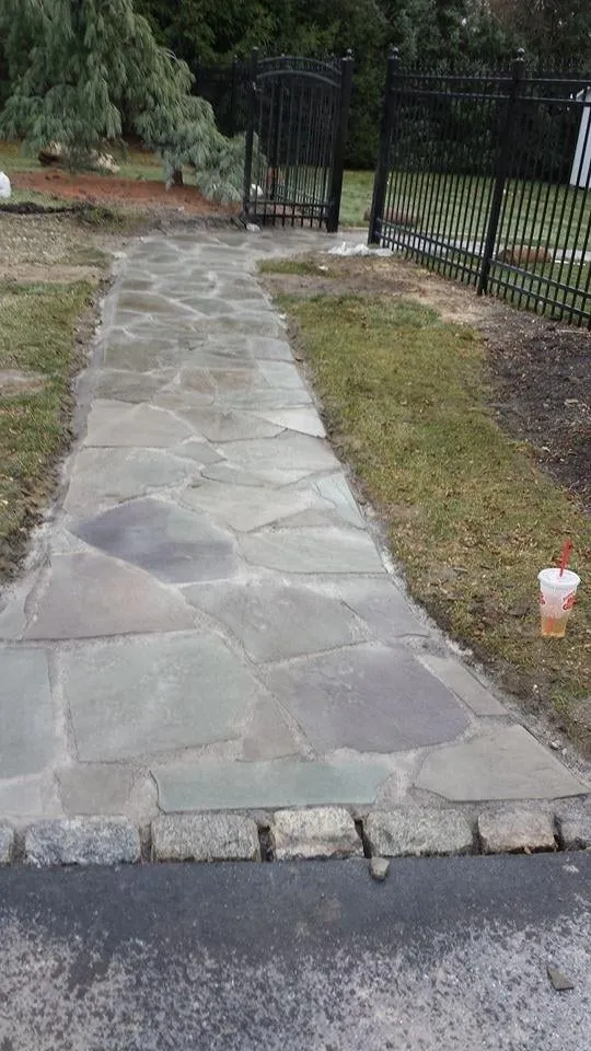 Professional lawn care service experts serving Ronkonkoma, NY - All Phases Asphalt & Landscaping Design Corp