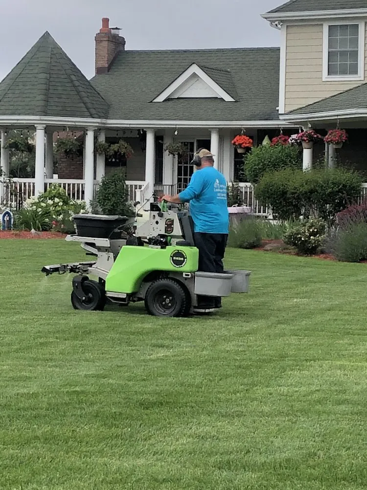 Custom lawn mowing service in Manorville, NY by All Scapes Landscape Design