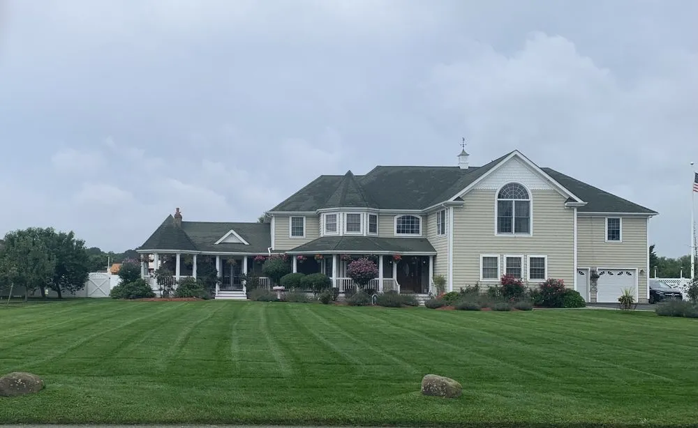 Expert yard maintenance in Manorville, NY by All Scapes Landscape Design