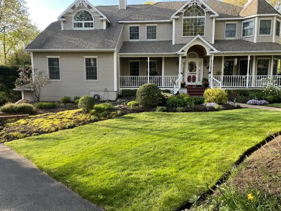 Reliable lawn mowing service in Manorville, NY by All Scapes Landscape Design