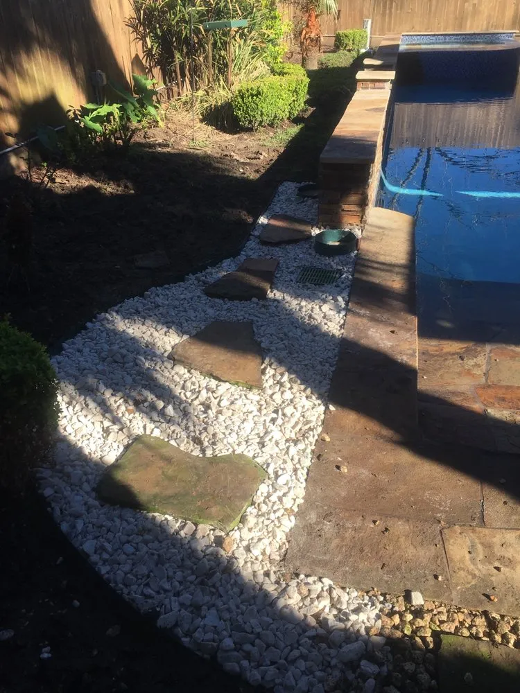 Professional yard maintenance for residential properties across Stafford, TX - All Seasons Landscape and Lighting