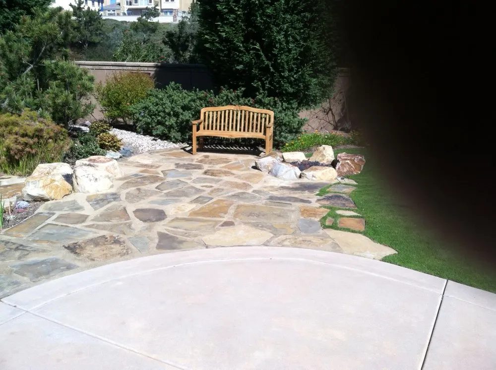 Custom garden landscaping with custom design in Carlsbad, CA by All Seasons Landscape Construction And Management