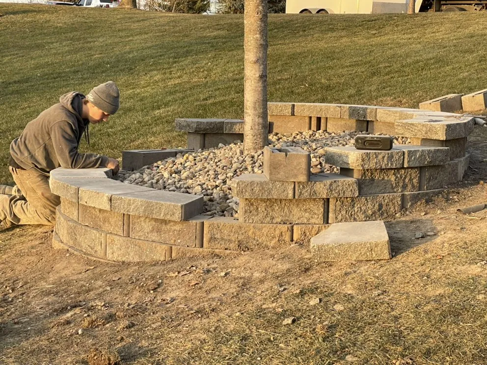 Affordable landscape installation with custom design in Milan, IL by All Seasons Lawnscape