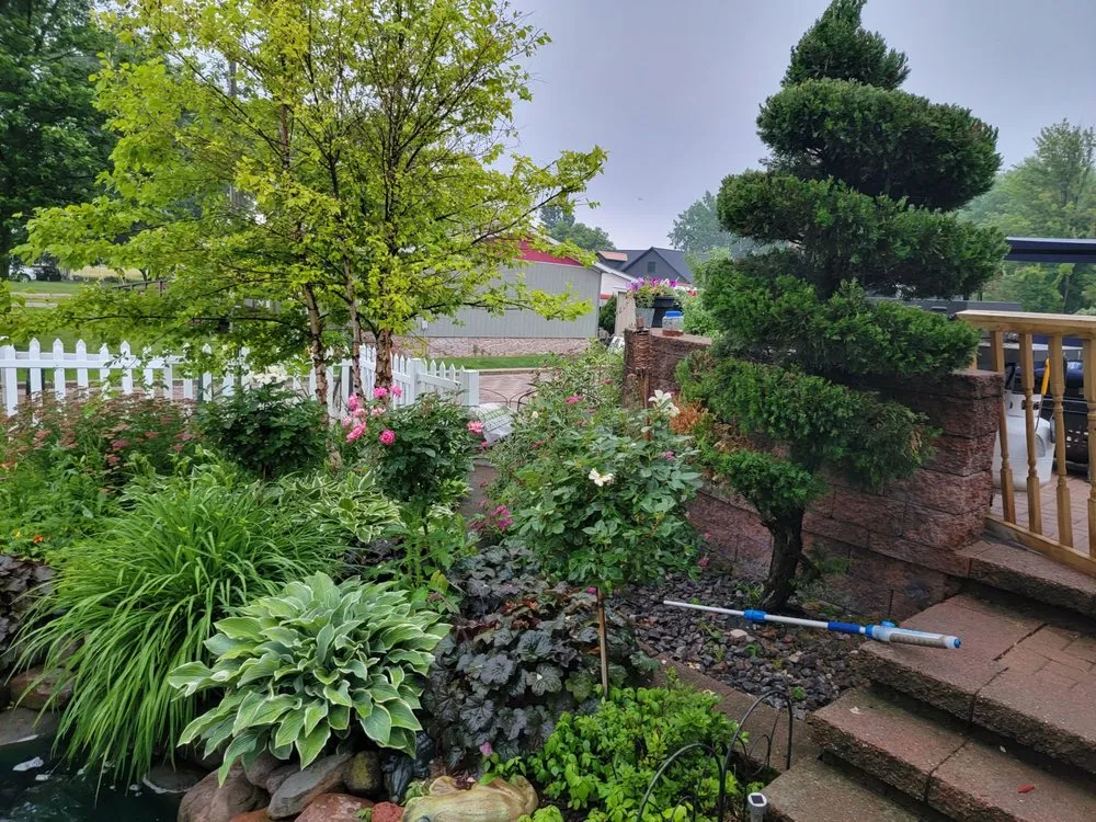 Affordable lawn care service with custom design across De Pere, WI - All services & Landscaping