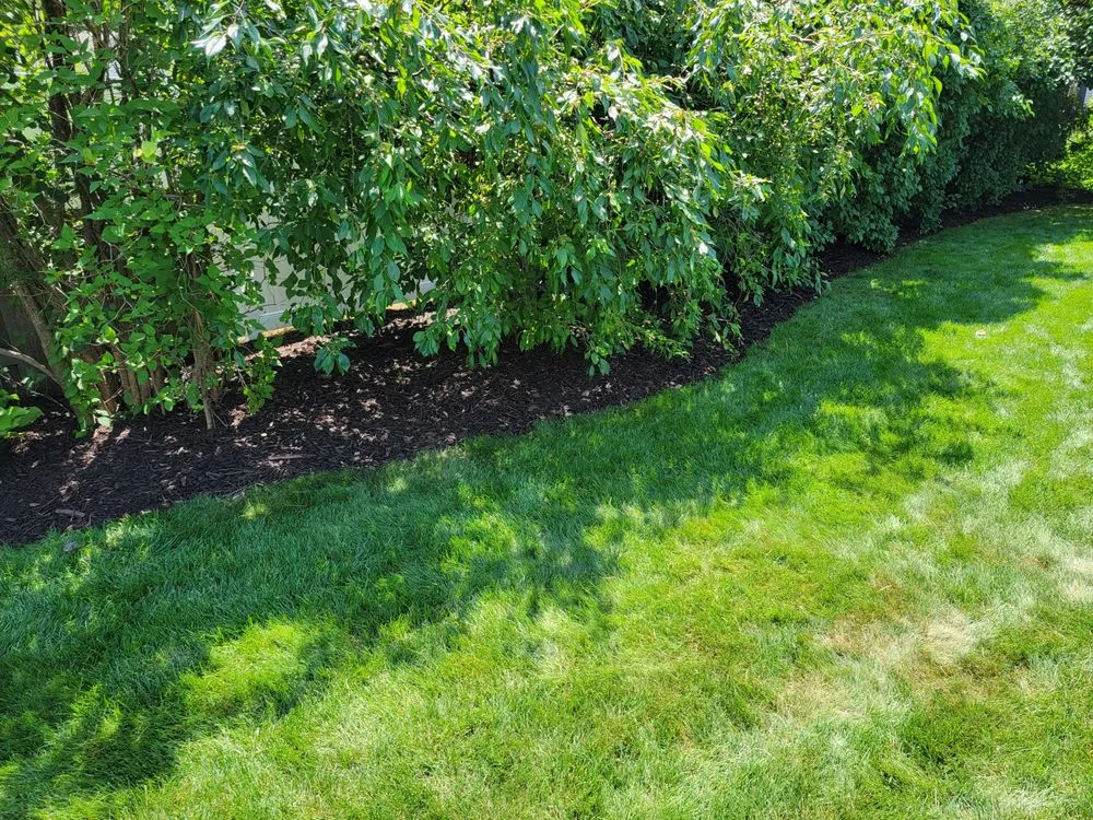 Custom landscape design for outdoor upgrades across De Pere, WI - All services & Landscaping