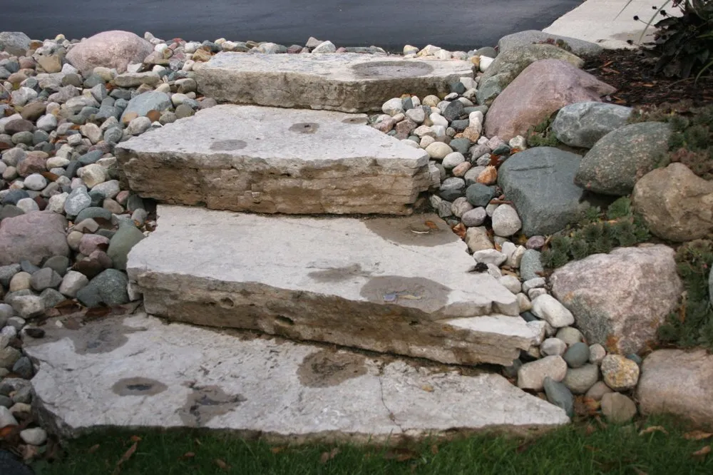 Affordable yard cleanup service with custom design in Lansing, MI by All Terra Landscape Services