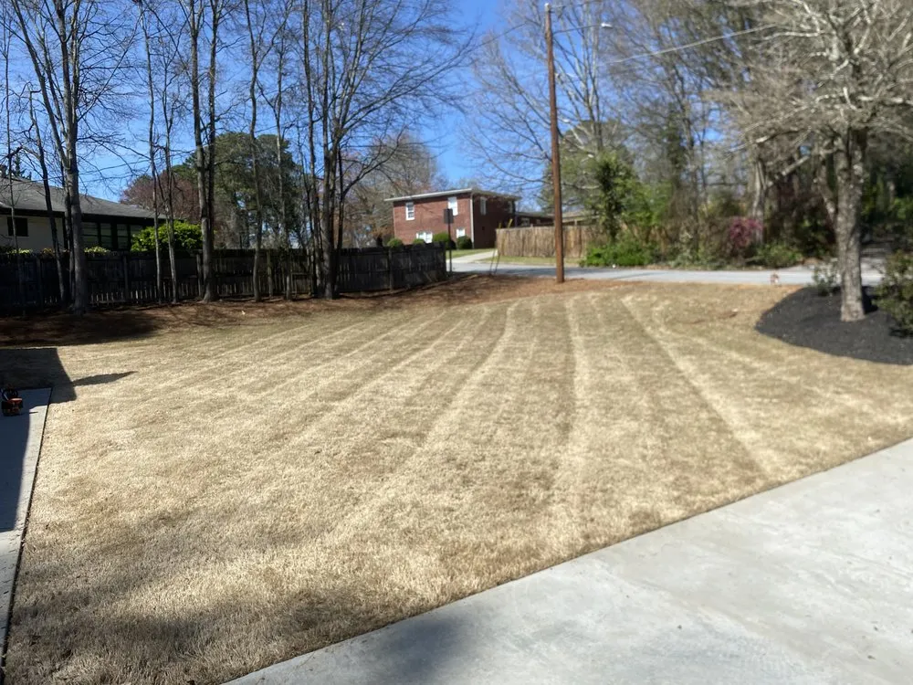 Professional lawn mowing service for residential properties in Lawrenceville, GA by All United LawnCare