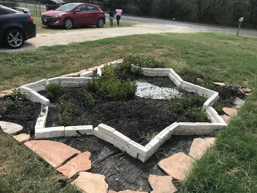 Affordable lawn care service with custom design in Adkins, TX by All Well Landscaping and Lawn Service