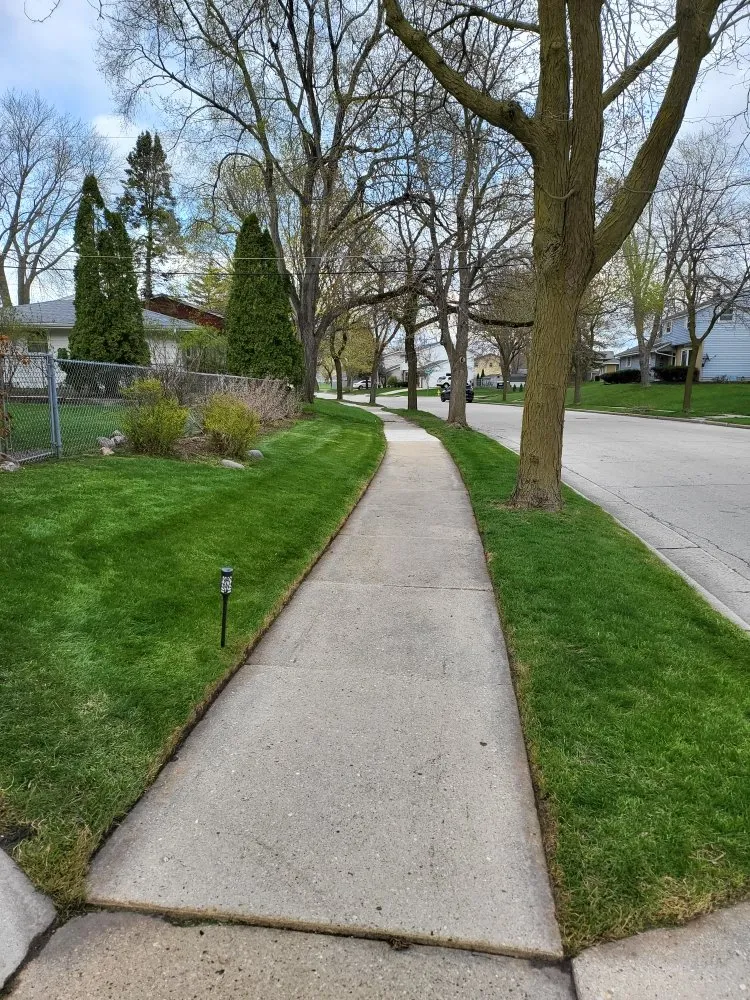Reliable lawn care service in West Allis, WI by All Year Round Landscaping