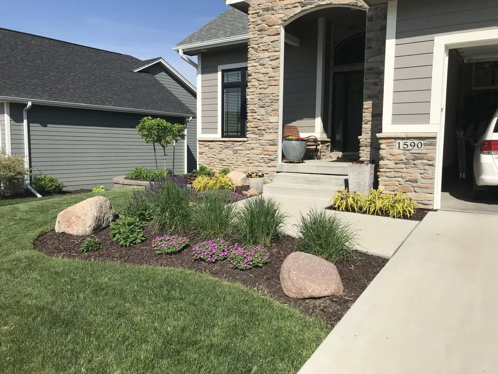 Professional yard maintenance for year-round maintenance in Des Moines, IA by Allen Lawn Care And Landscaping