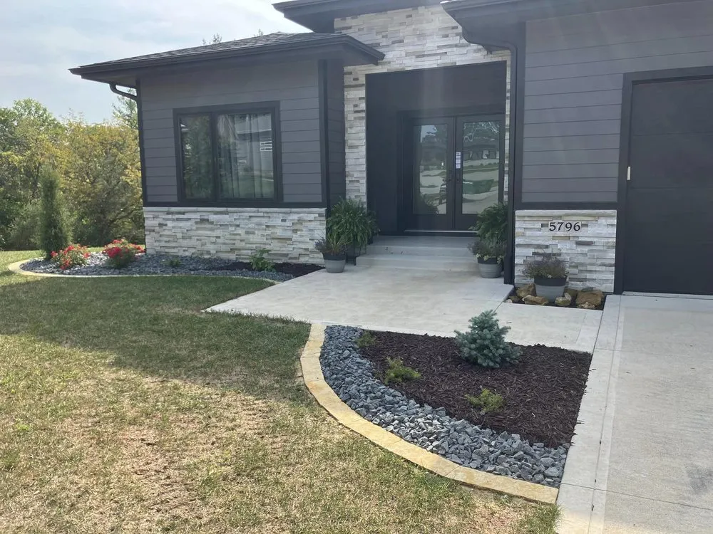 Custom landscape design in Des Moines, IA by Allen Lawn Care And Landscaping