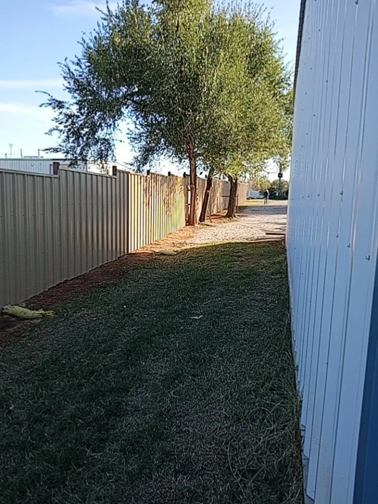 Affordable yard cleanup service in Oklahoma City, OK by Allen Lawn Service