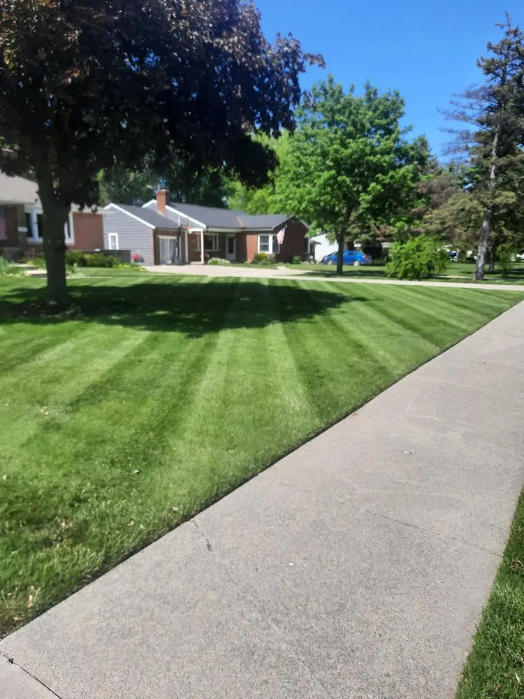 Reliable lawn mowing service for year-round maintenance across Kimball, MI - Allen's Lawn Maintenance