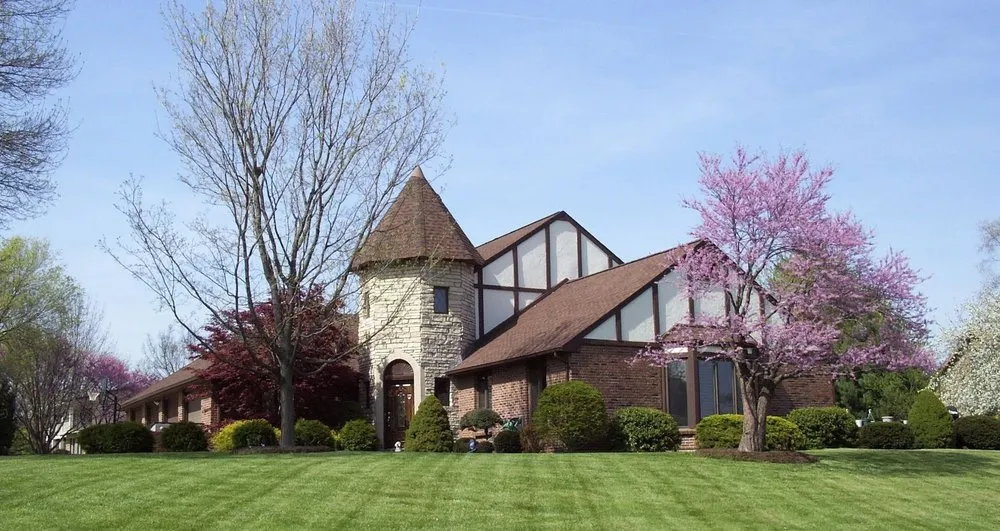 Expert yard maintenance for homes in Wentzville, MO by Allen's Tree Service