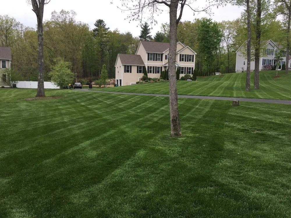 Expert garden landscaping with custom design in Auburn, NH by Alliance Landscaping