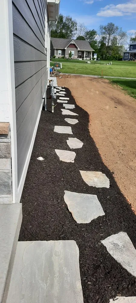 Custom landscape design for residential properties across Martinsville, IN - Allscape Landscaping And Lawn Care