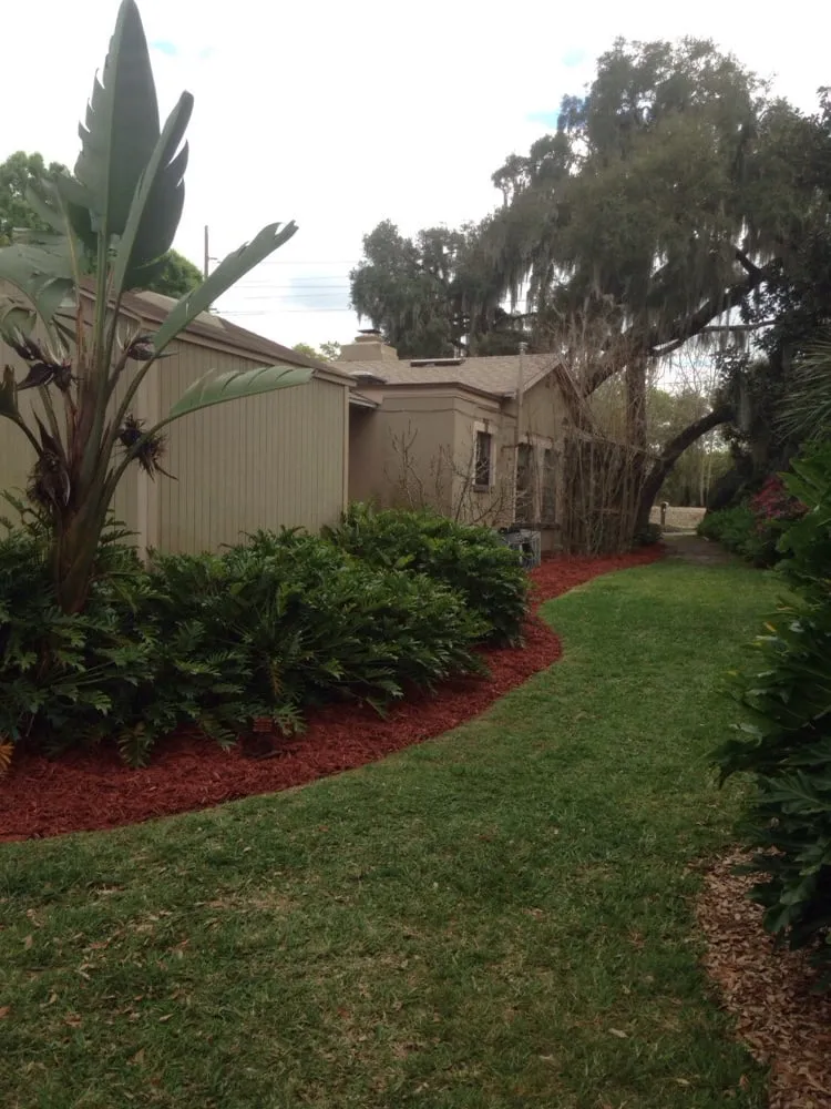 Custom garden landscaping for year-round maintenance in Eustis, FL by Allscapes by Jeremy