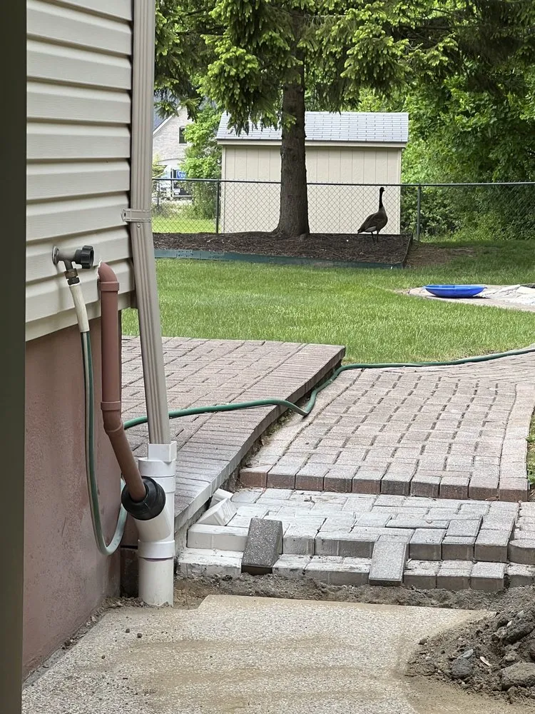 Custom landscape installation for outdoor upgrades across Warren, MI - Alltimate Outdoor Services