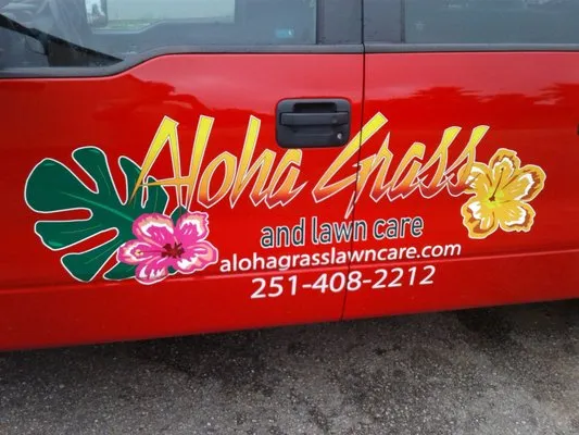 Aloha grass lawn care Logo