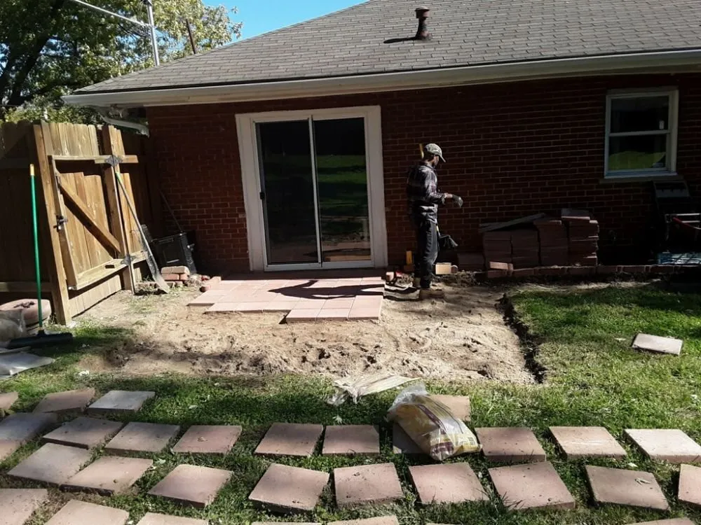 Reliable lawn care service for outdoor upgrades in Kansas City, MO by Alpha Landscaping and Home Renovation