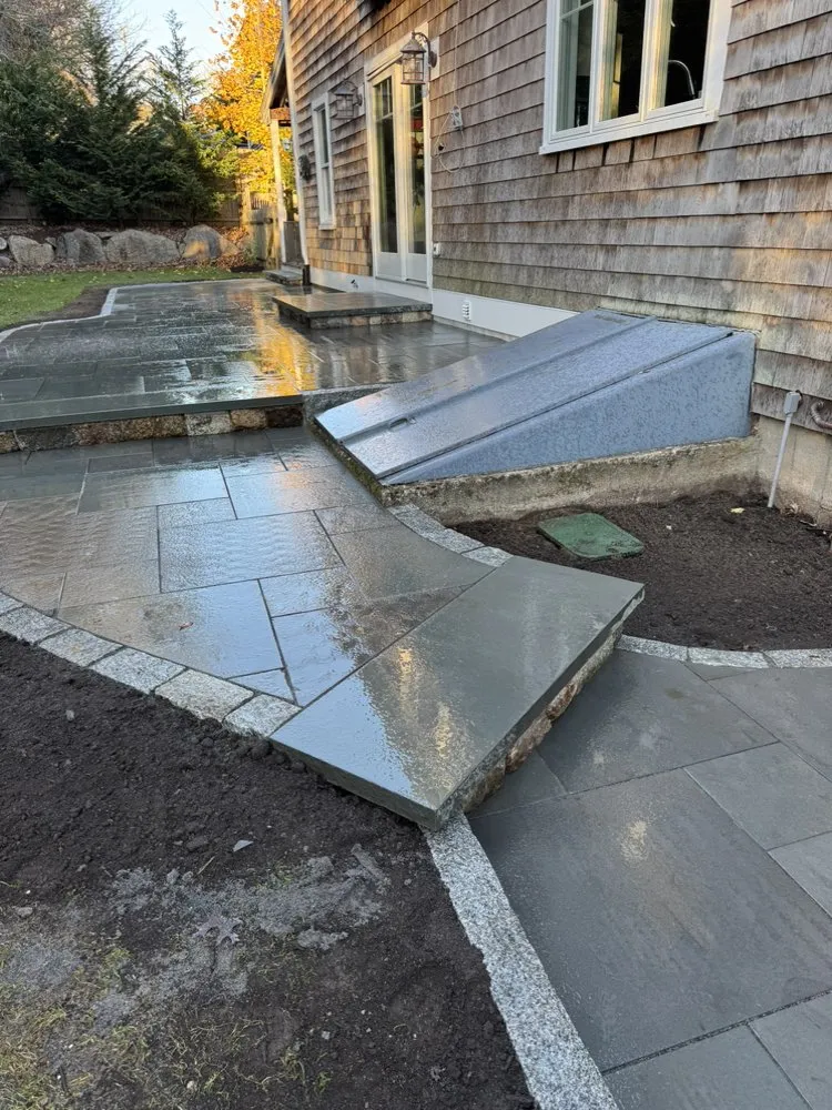 Affordable landscape design in West Yarmouth, MA by AlphaStone & Landscaping
