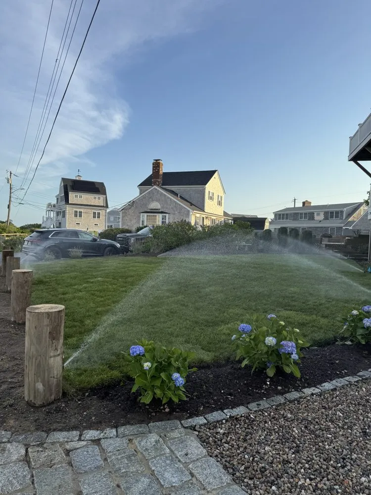 Expert lawn mowing service for residential properties in West Yarmouth, MA by AlphaStone & Landscaping