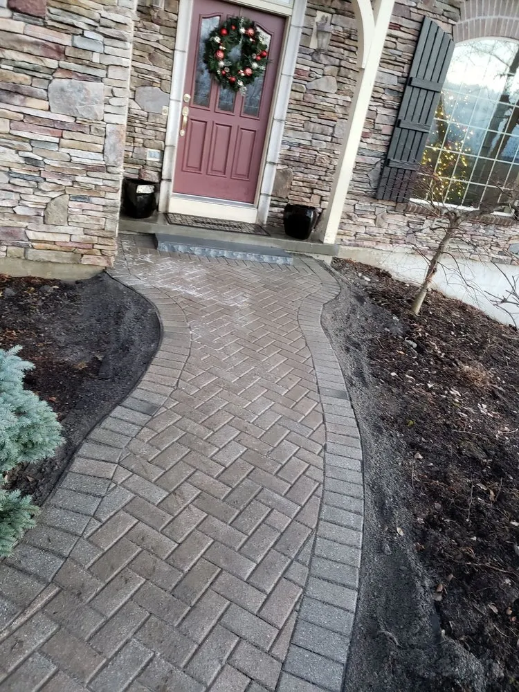 Reliable lawn mowing service for year-round maintenance in Syracuse, NY by Altar Rock Group of NY