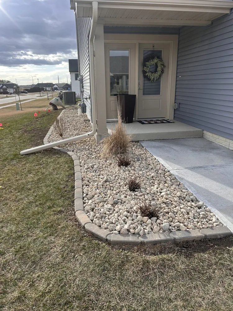 Local residential landscaping for year-round maintenance in Cedar Rapids, IA by Alternative Outdoor Services