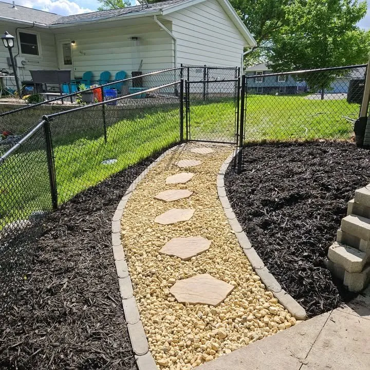 Affordable lawn mowing service for homes in Cedar Rapids, IA by Alternative Outdoor Services