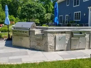 Custom residential landscaping in Newtown, CT by Alvarez Masonry