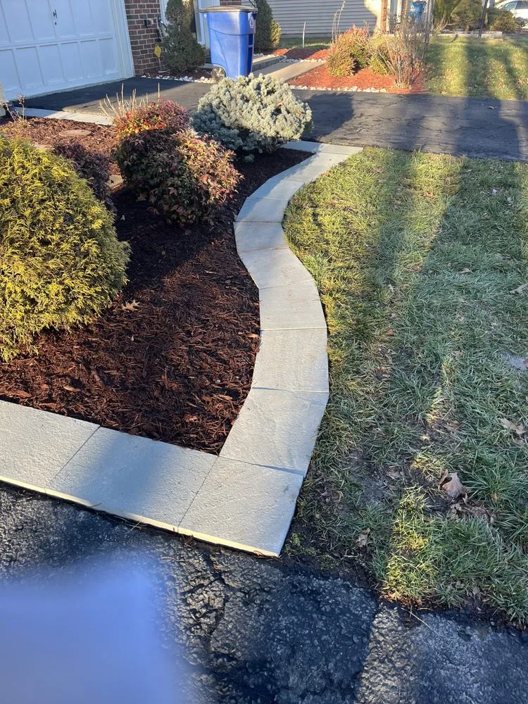 Affordable garden landscaping in Alexandria, VA by Alvaro Stone Repair And Lawncare
