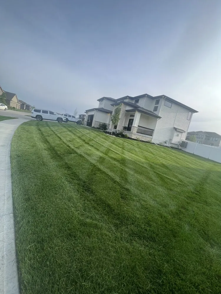 Reliable lawn mowing service for homes in Council Bluffs, IA by AM & SR
