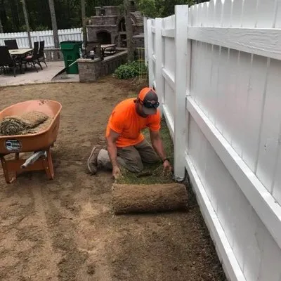 A&M Landscaping and Grading Logo