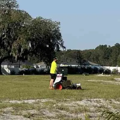 Expert lawn mowing service for outdoor upgrades in St Augustine, FL by AMASA Logistics Account